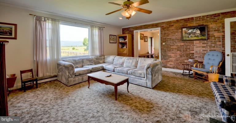 13127 Graceham Road Rocky Ridge, MD 21778 - Photo 9 of 19 a living room with furniture and a window
