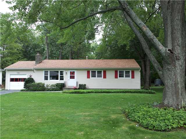 141 Furlong Road Brighton, NY 14623 - Photo 1 of 1 Exterior Front. Mature lot with huge red oaks, whi