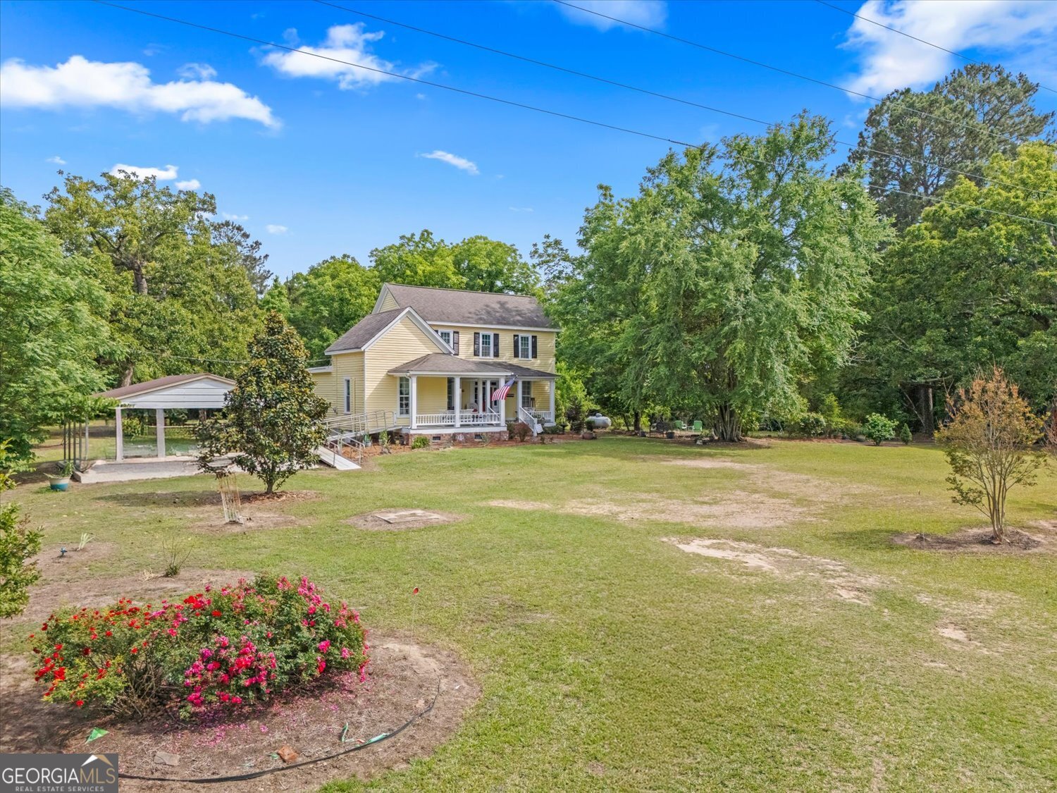 6644 East Cadley Road Norwood, GA 30821 - Photo 2 of 53 a view of a house with a swimming pool