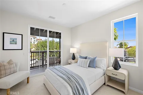 a view of a chair and table in the balcony
