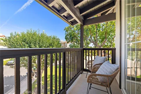 a en suite bathroom with double sink and a mirror