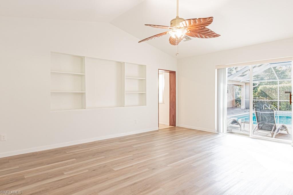 590 6th Street Northeast Naples, FL 34120 - Photo 14 of 50 Open living space with built-ins