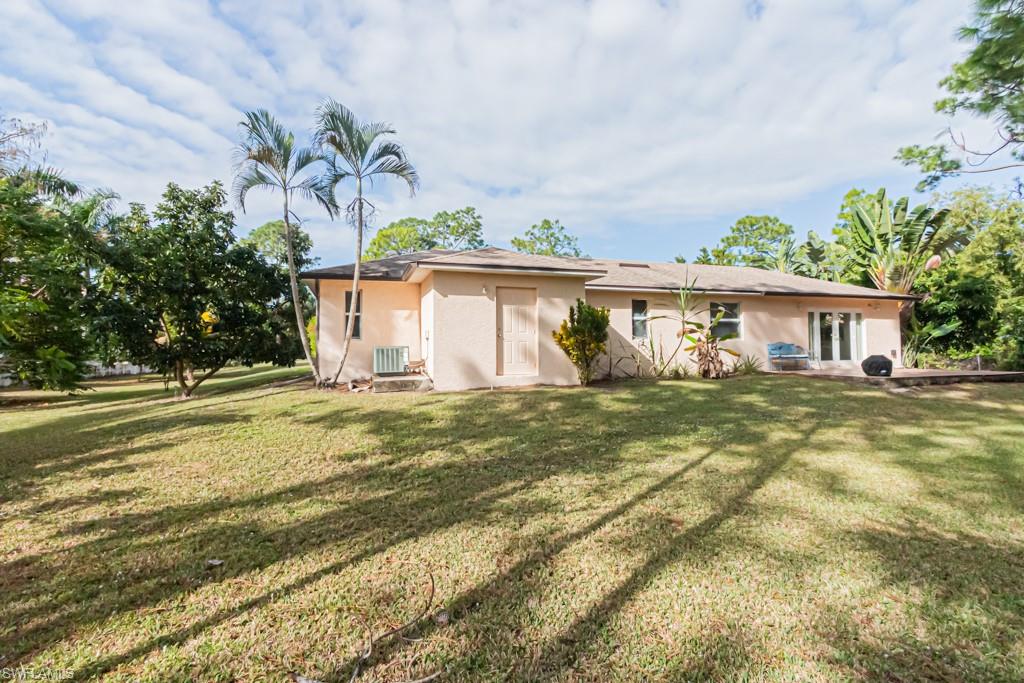 590 6th Street Northeast Naples, FL 34120 - Photo 49 of 50 Back of property with expansive yard