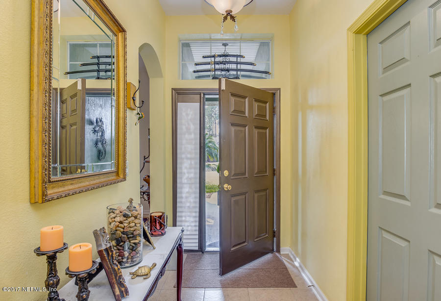 9141 Raptor Drive Jacksonville, FL 32221 - Photo 4 of 25 a very nice looking room with a bench