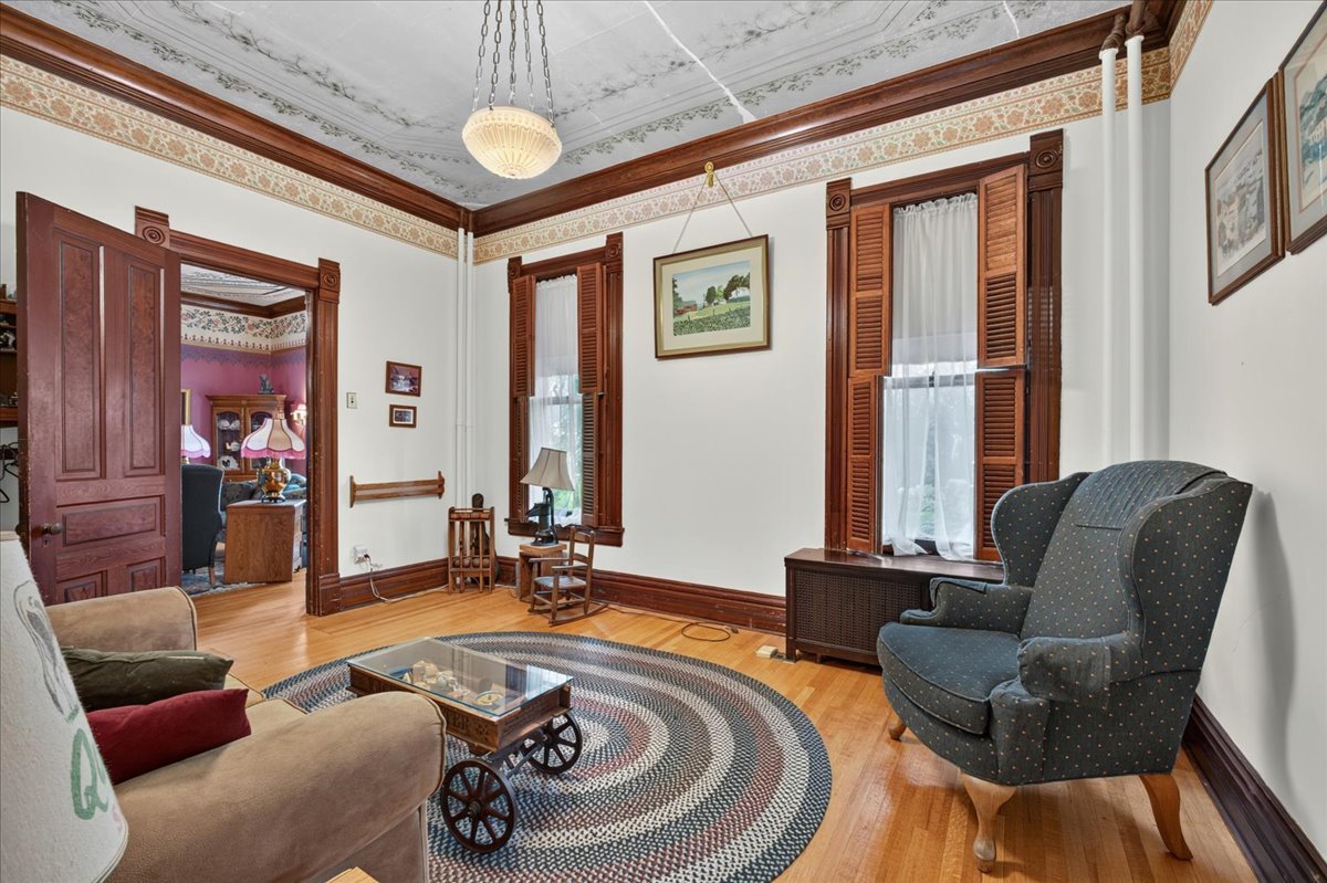 622 North 7th Street Rochelle, IL 61068 - Photo 16 of 52 a living room with furniture and a large window