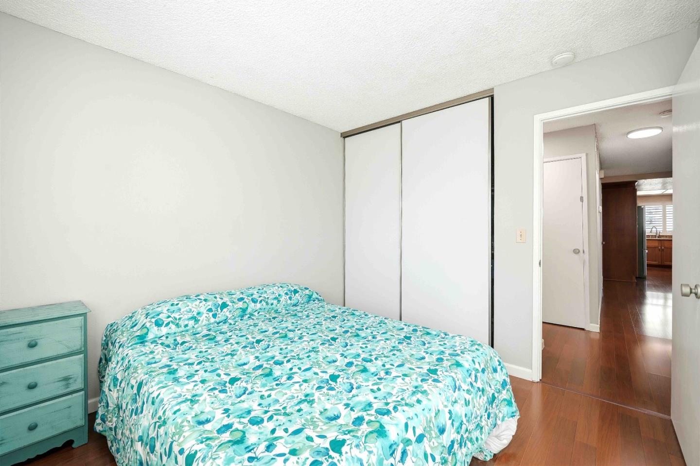 925 Blake Court Gilroy, CA 95020 - Photo 17 of 30 a bedroom with a bed and a dresser