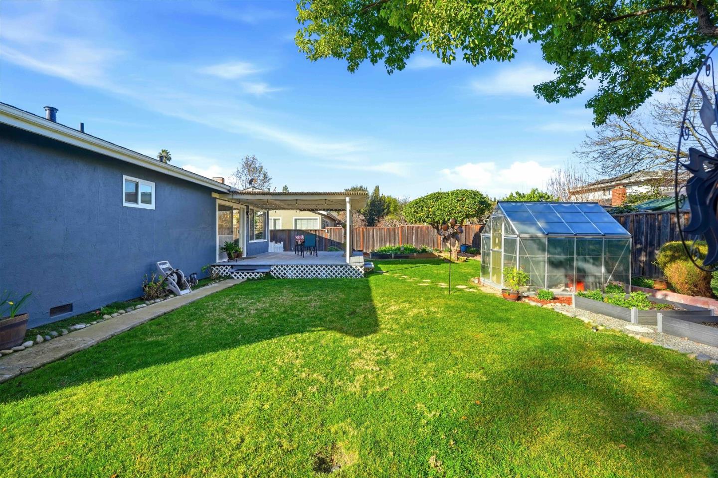 925 Blake Court Gilroy, CA 95020 - Photo 22 of 30 a view of an house with backyard space and balcony