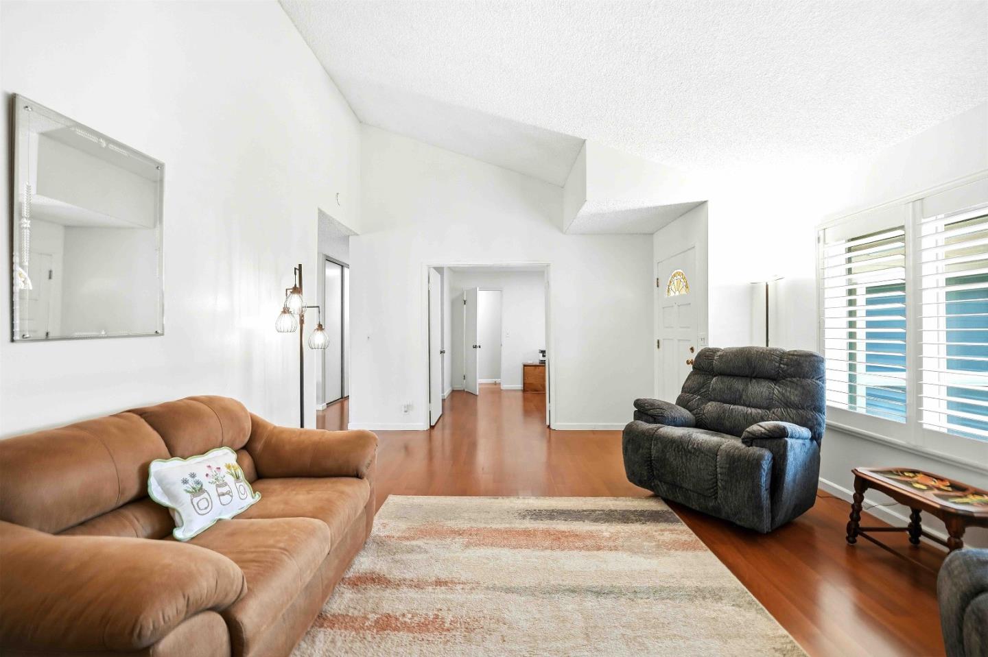 925 Blake Court Gilroy, CA 95020 - Photo 7 of 30 a living room with furniture and a couch
