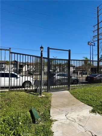 a view of house with a swimming pool