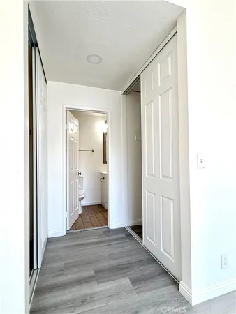 a bathroom with a toilet sink and shower