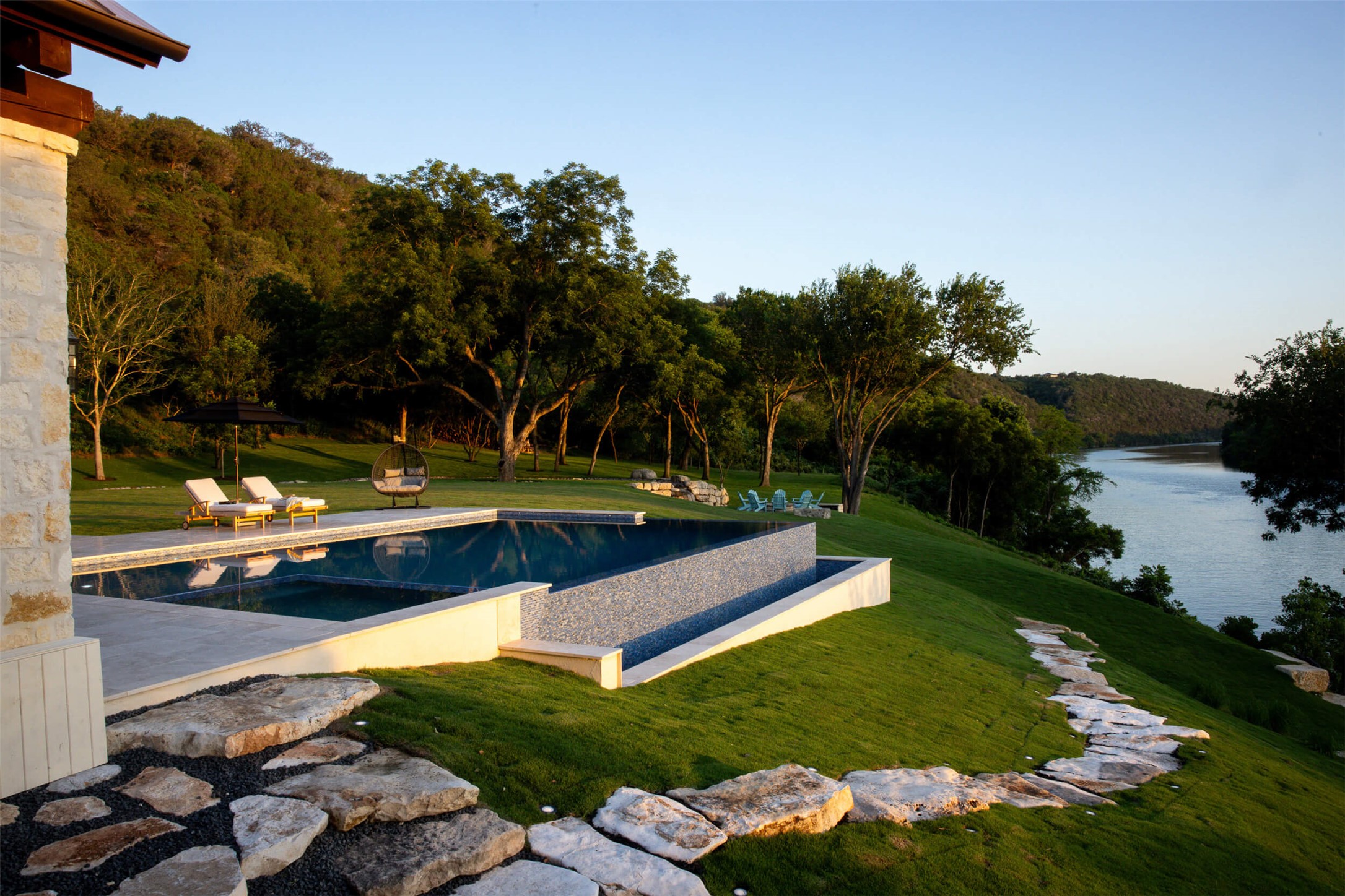 15016 Flat Top Ranch Road Austin, TX 78732 - Photo 13 of 40 Outdoor pool with a lawn, a water view, and a patio area