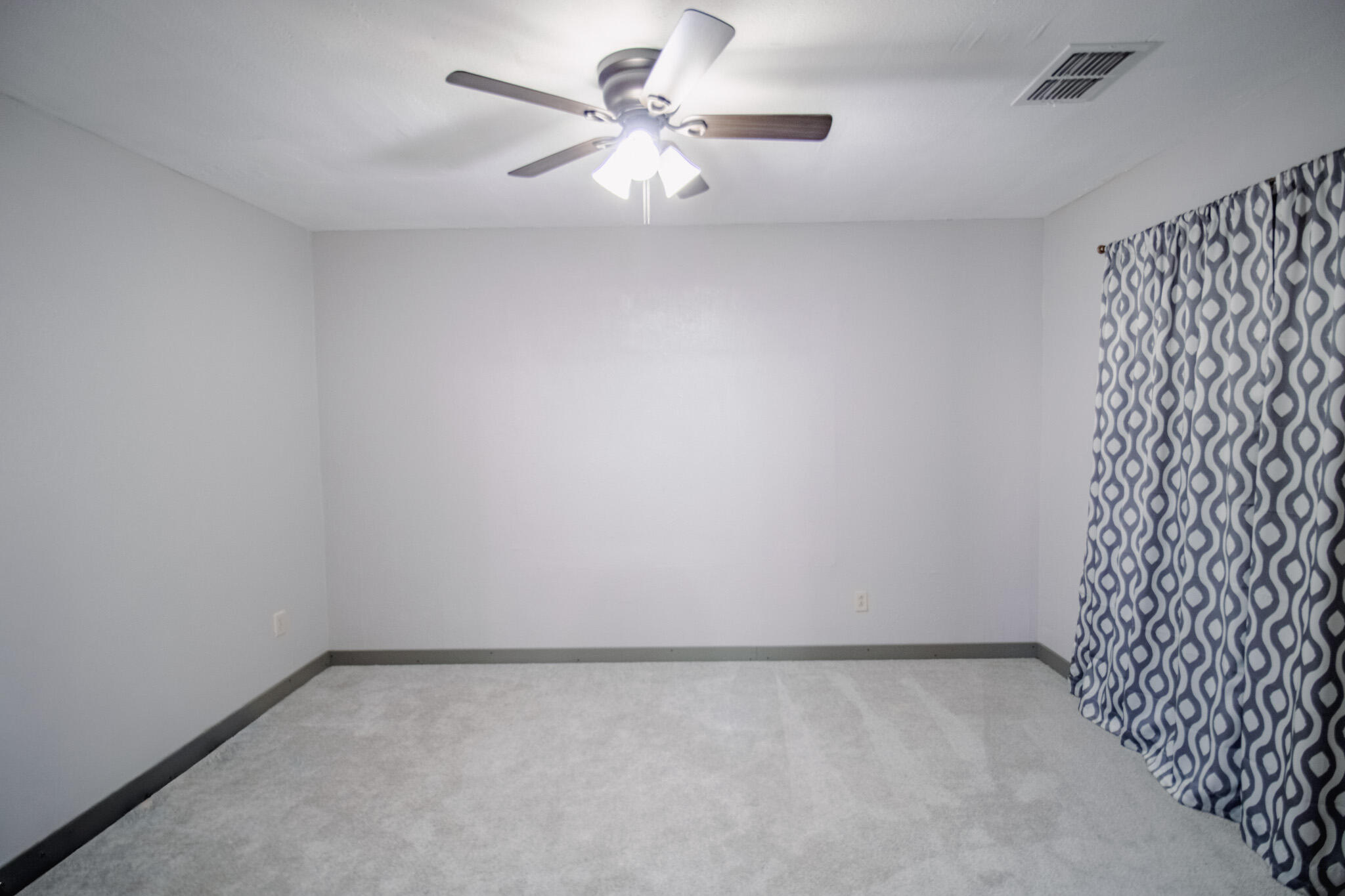 3114 Baylor Street Lubbock, TX 79415 - Photo 6 of 11 a view of an empty room