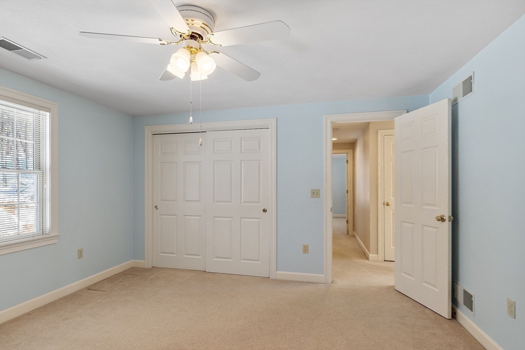 220 Hayden Road Groton, MA 01450 - Photo 30 of 37 wooden floor in an empty room with a window