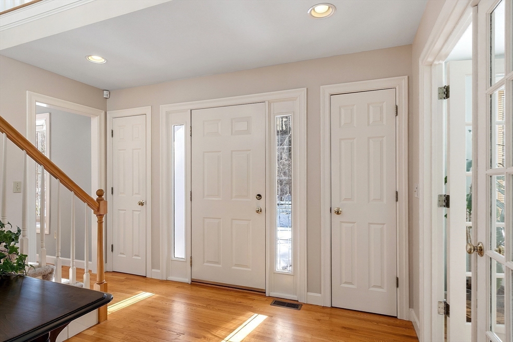 220 Hayden Road Groton, MA 01450 - Photo 6 of 37 a view of an entryway with wooden floor