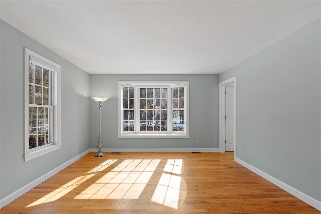 220 Hayden Road Groton, MA 01450 - Photo 9 of 37 a view of an empty room with a window