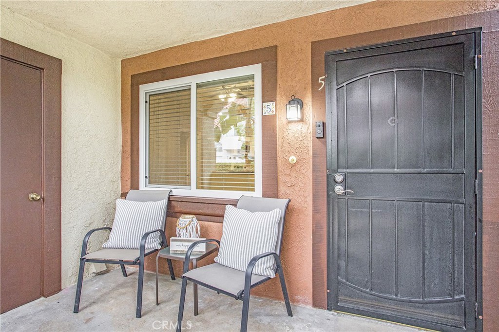 5 Rosa, Unit 140 Rancho Santa Margarita, CA 92688 - Photo 10 of 30 Private covered patio with extra storage