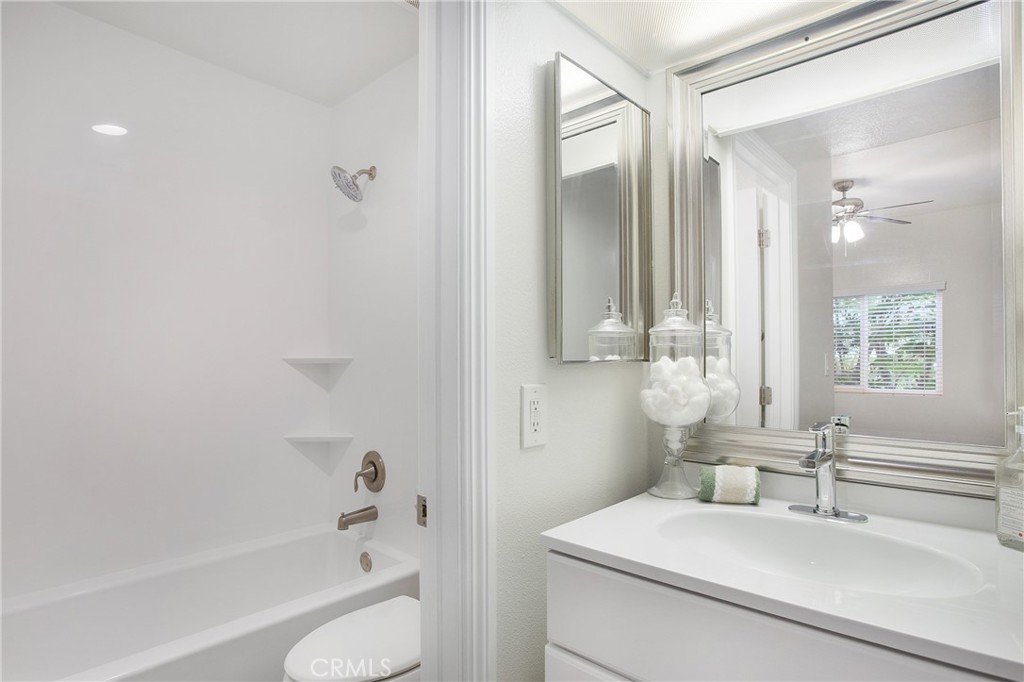 5 Rosa, Unit 140 Rancho Santa Margarita, CA 92688 - Photo 6 of 30 Primary bath with newly remodeled bathroom