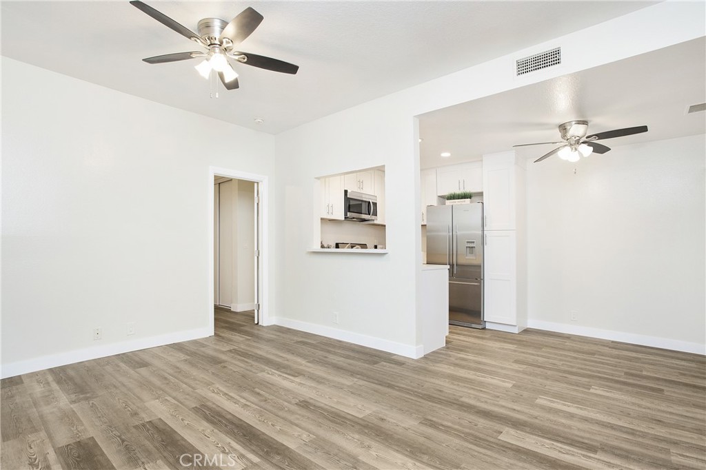 5 Rosa, Unit 140 Rancho Santa Margarita, CA 92688 - Photo 30 of 30 Open floor plan with NEW Luxury Vinyl plank flooring throughout