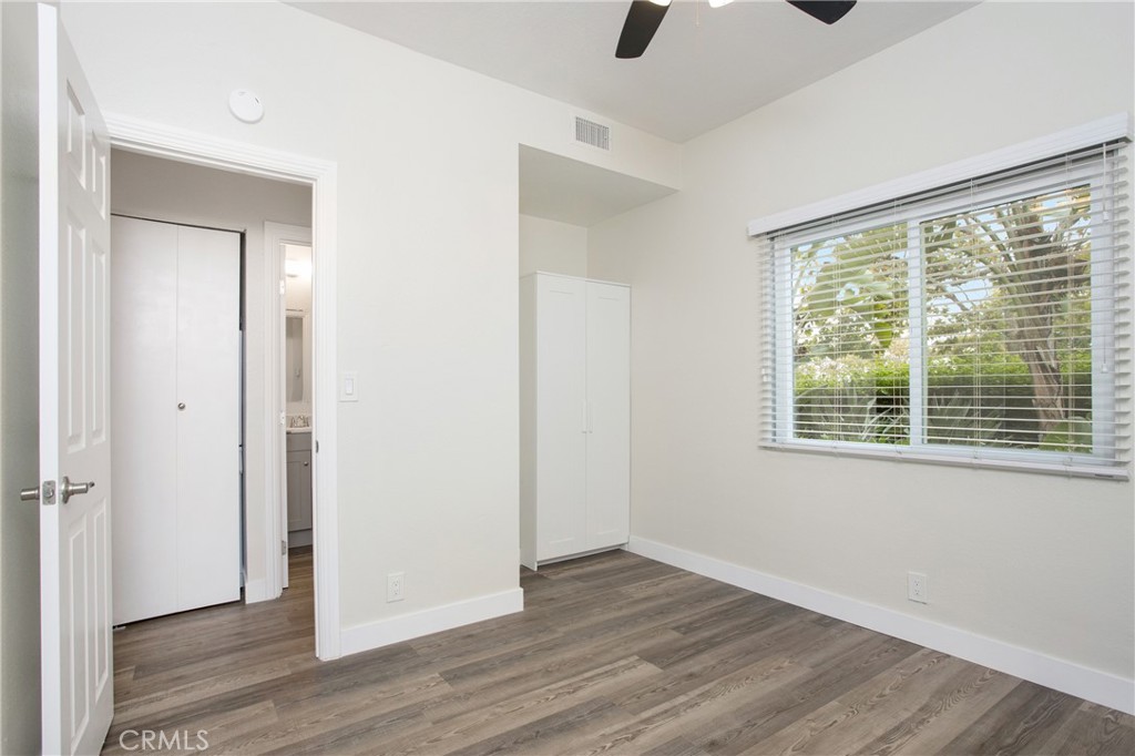 5 Rosa, Unit 140 Rancho Santa Margarita, CA 92688 - Photo 7 of 30 Spacious secondary bedroom with new built in wardrobe, panel doors and new hardware