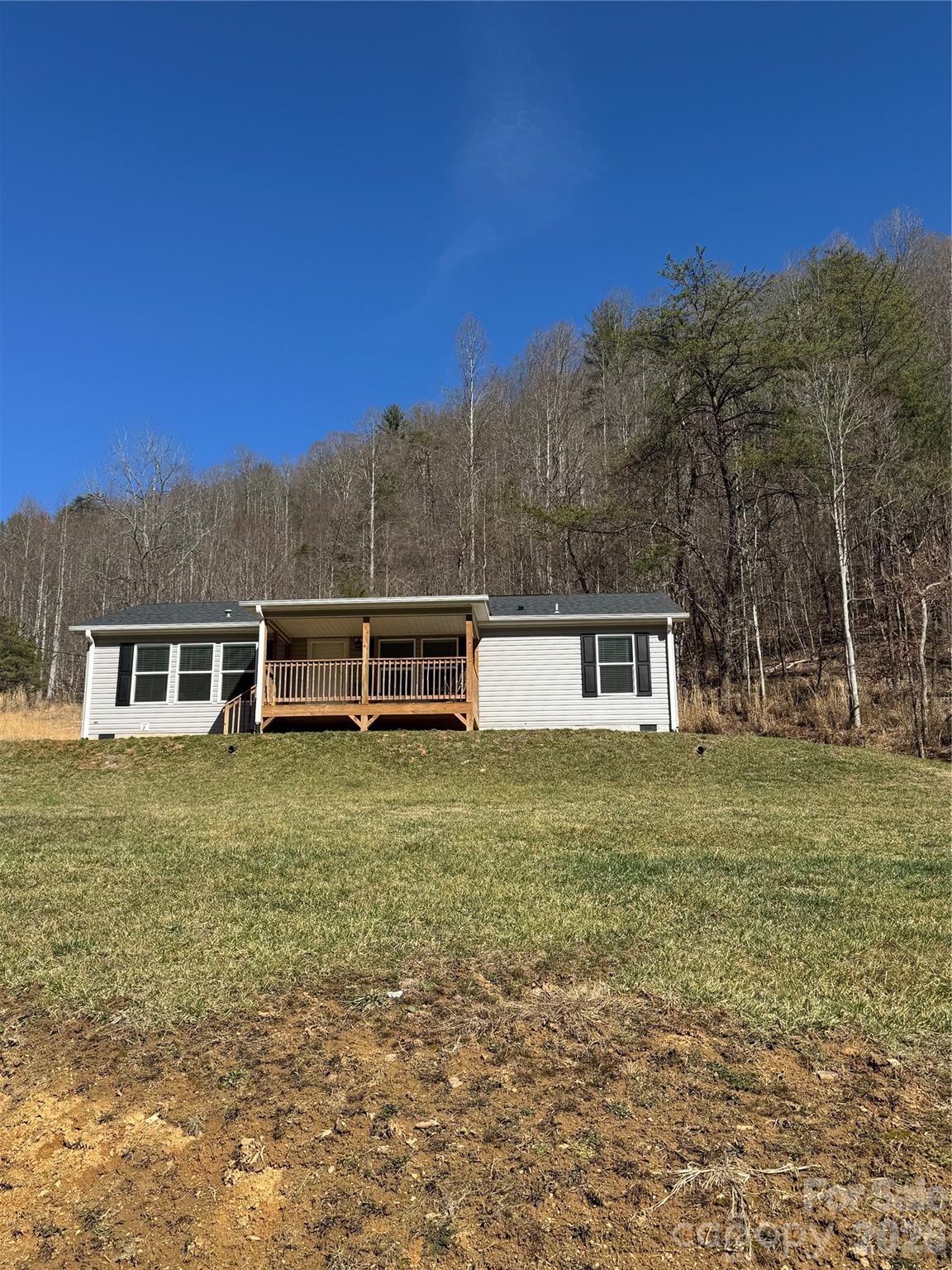 4958 Grapevine Road Marshall, NC 28753 - Photo 1 of 43 a view of a house with a yard