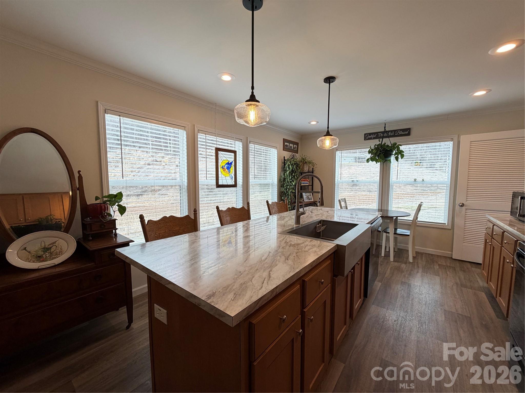 4958 Grapevine Road Marshall, NC 28753 - Photo 26 of 43 a kitchen with sink stove and wooden floor