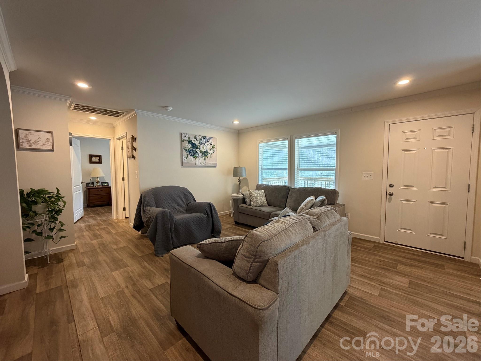 4958 Grapevine Road Marshall, NC 28753 - Photo 30 of 43 a living room with furniture and a wooden floor