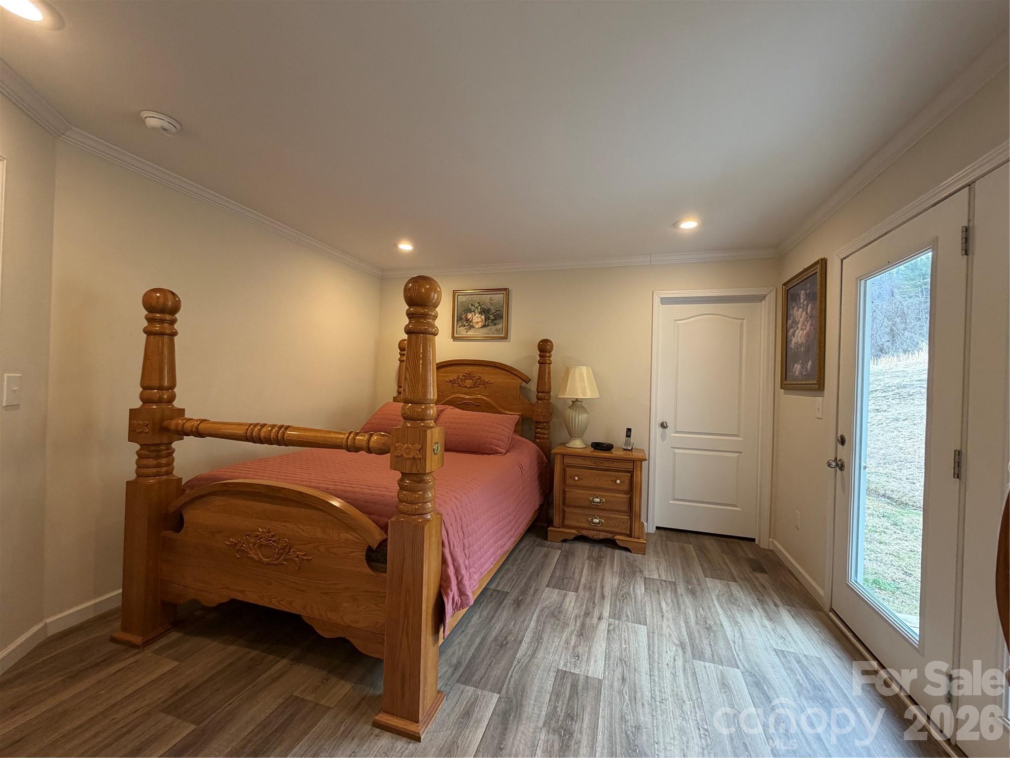 4958 Grapevine Road Marshall, NC 28753 - Photo 32 of 43 a bed room with a bed and a large window