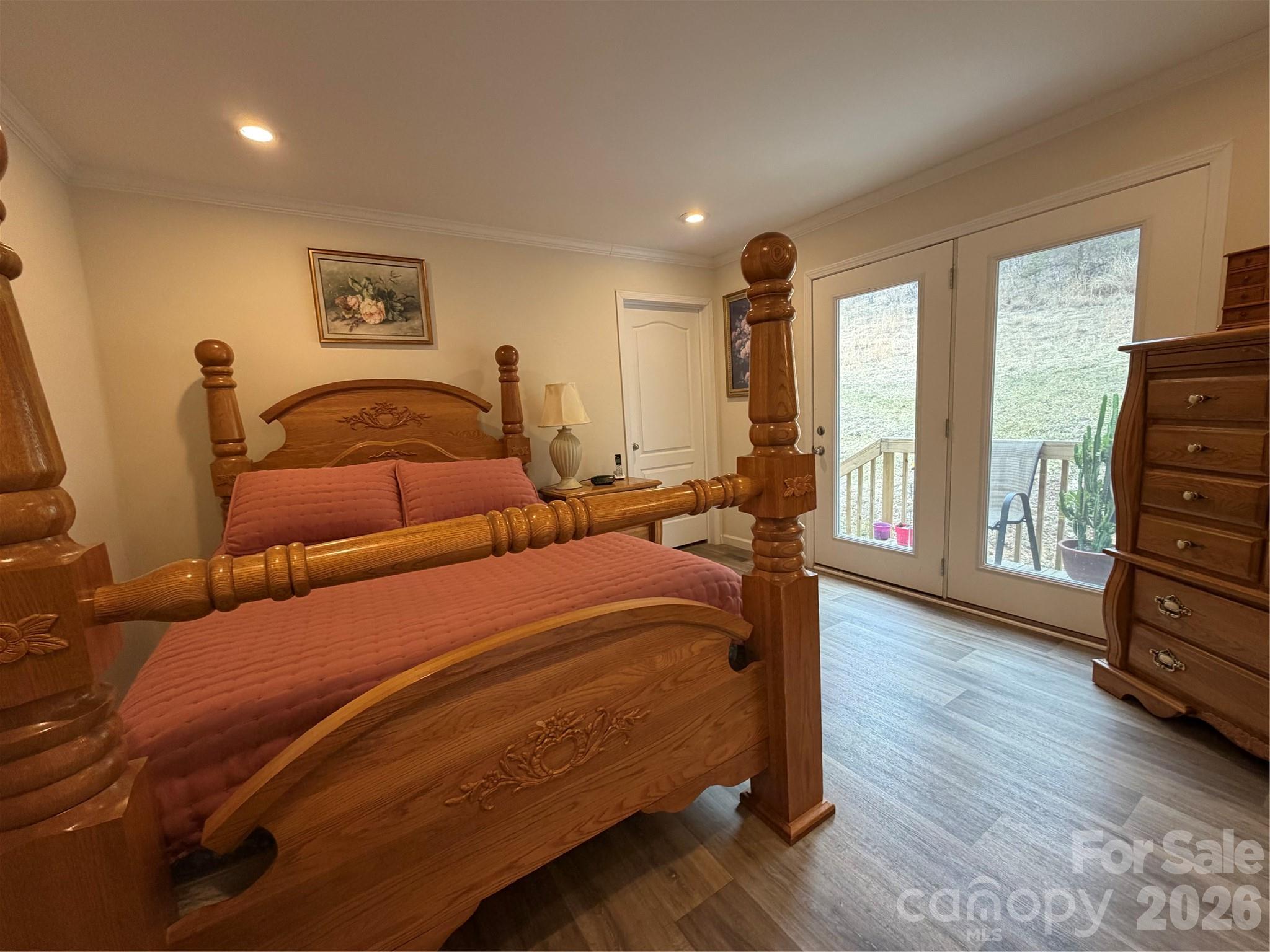 4958 Grapevine Road Marshall, NC 28753 - Photo 33 of 43 a bedroom with two beds and wooden floor