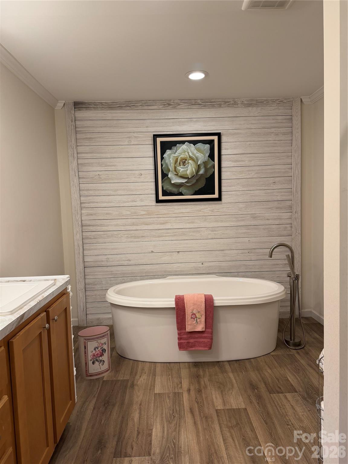 4958 Grapevine Road Marshall, NC 28753 - Photo 34 of 43 a bathroom with a sink and bathtub