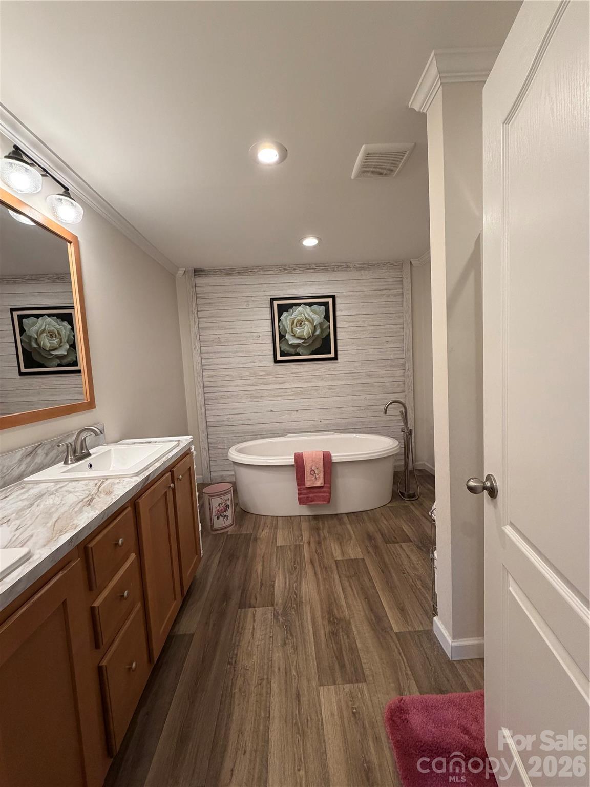 4958 Grapevine Road Marshall, NC 28753 - Photo 36 of 43 a bathroom with a sink and a mirror