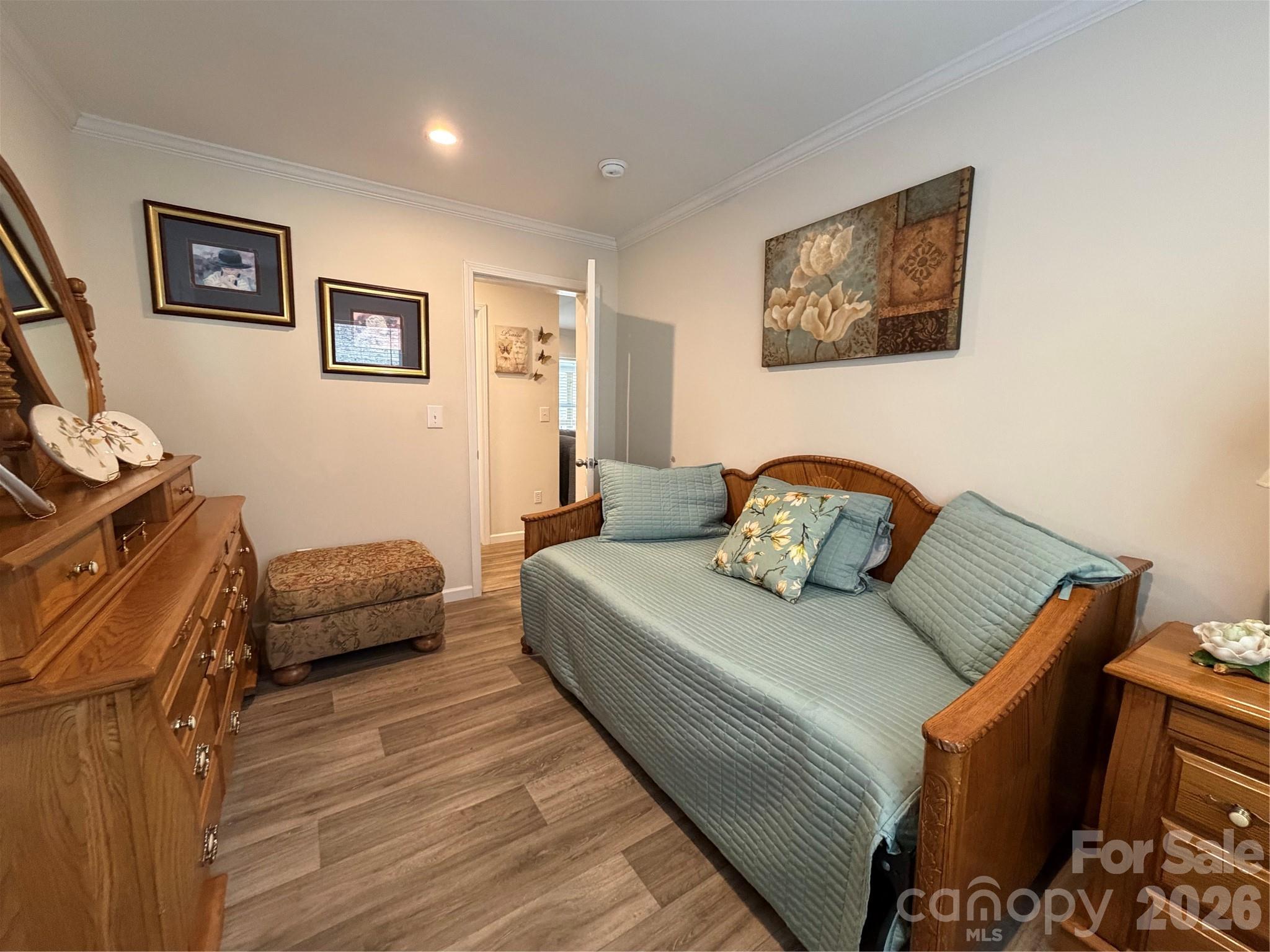 4958 Grapevine Road Marshall, NC 28753 - Photo 38 of 43 a bedroom with furniture and a wooden floor