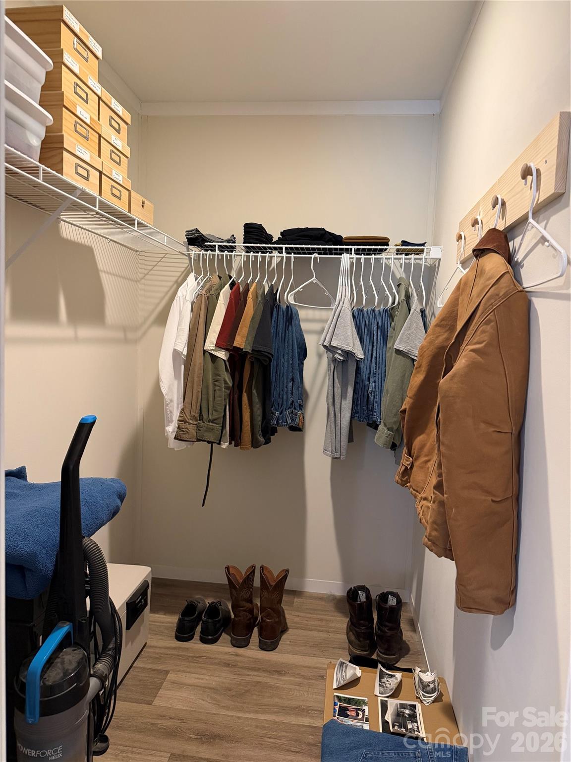4958 Grapevine Road Marshall, NC 28753 - Photo 42 of 43 a view of walk in closet with clothes and shoes