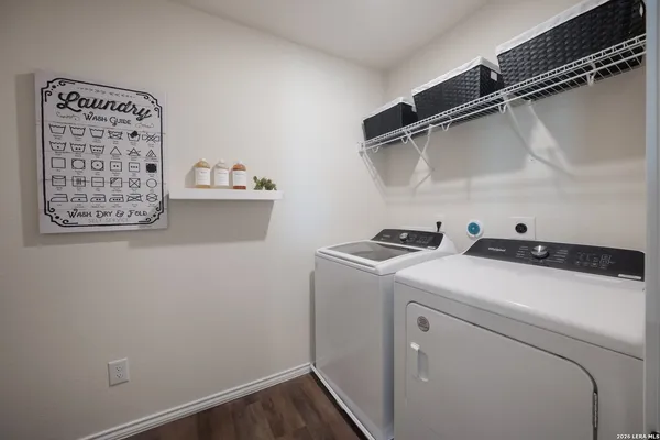 a utility room with dryer and washer