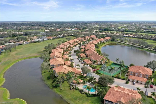 an aerial view of lake residential house with outdoor space