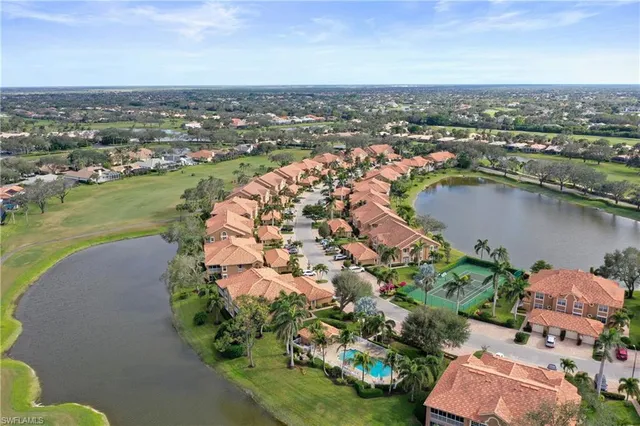 an aerial view of lake residential house with outdoor space