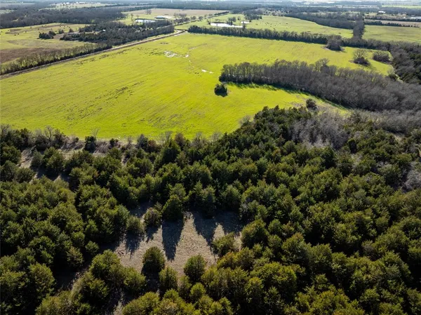 a view of an ocean with a house