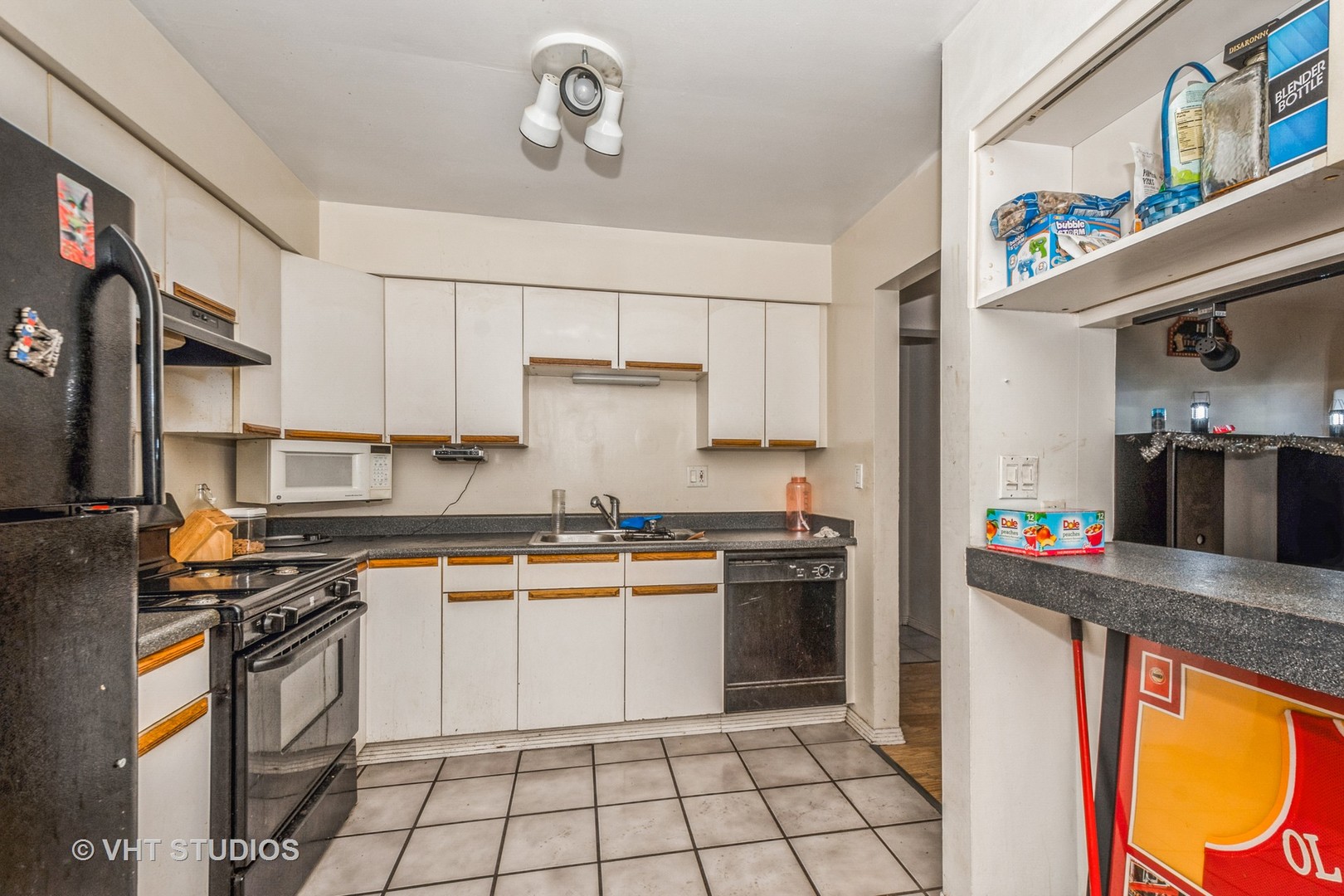 115 East Dundee Road, Unit 1S Wheeling, IL 60090 - Photo 5 of 9 a kitchen with stainless steel appliances granite countertop a stove a sink and a refrigerator