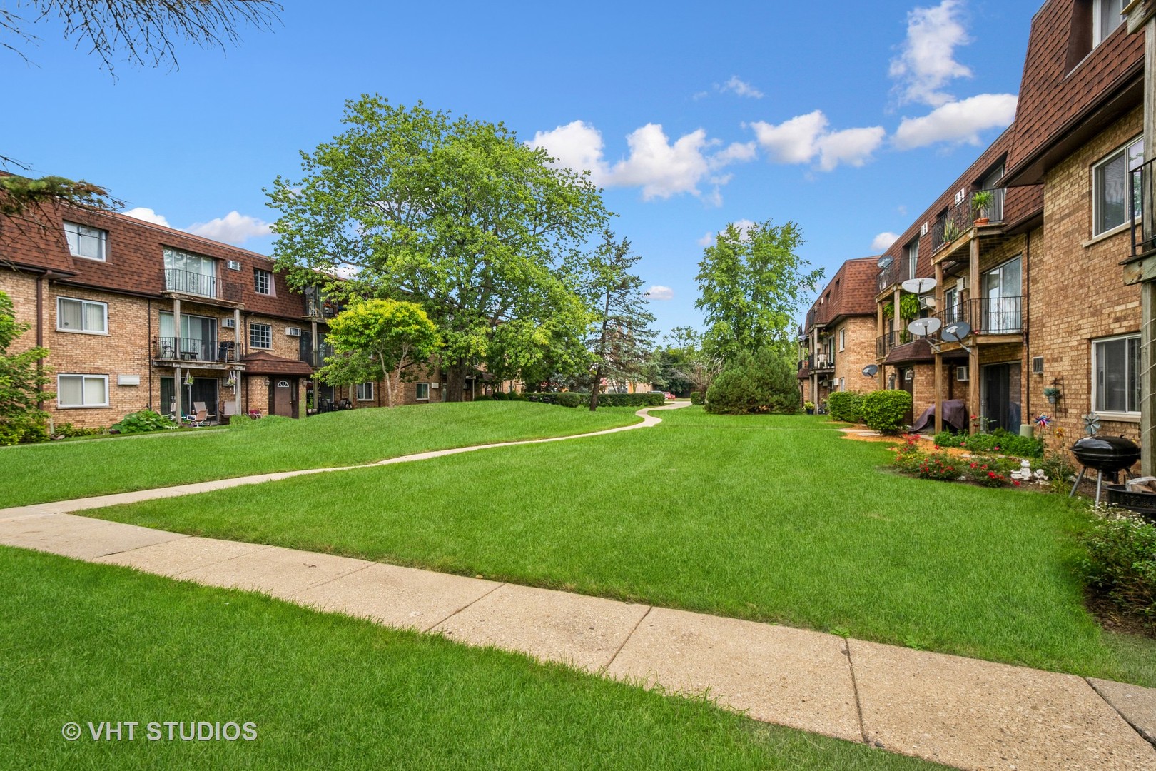 115 East Dundee Road, Unit 1S Wheeling, IL 60090 - Photo 8 of 9 a view of a street with a building in the background