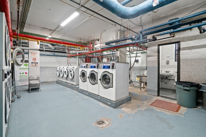35-31 85th Street, Unit 8L Queens, NY 11372 - Photo 11 of 14 a utility room with stainless steel appliances