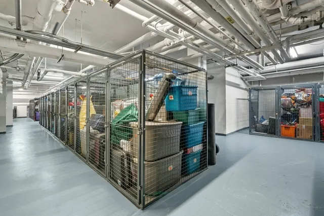 a group of cars parked in front of a building