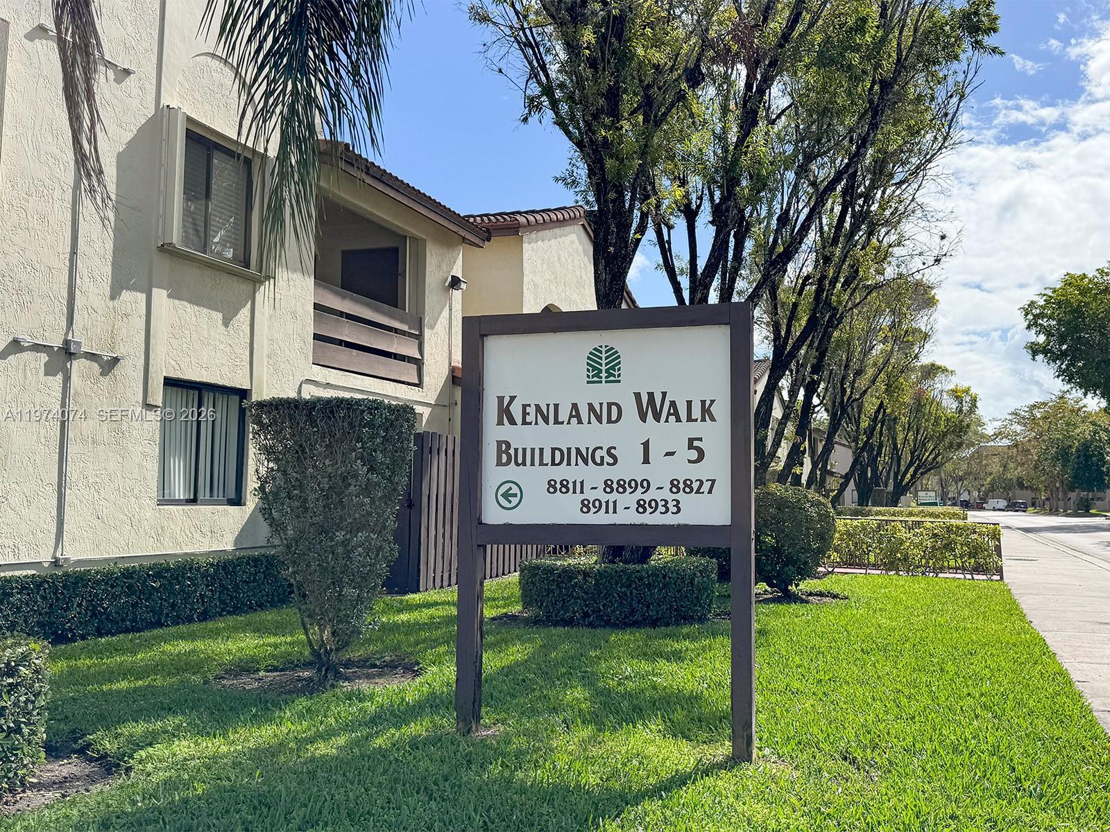 8911 Southwest 123rd Court, Unit 101 Miami, FL 33186 - Photo 2 of 15 a sign on the side of the building