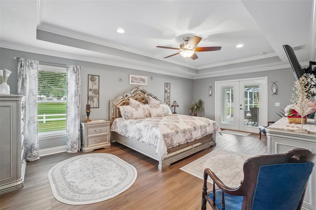 3934 Connersville Road Bartow, FL 33830 - Photo 6 of 81 a bedroom with a bed and wooden floor