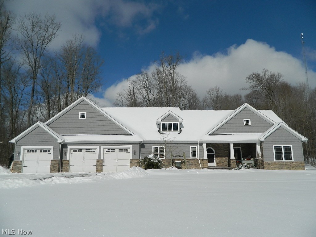 12464 Hotchkiss Road Burton, OH 44021 - Photo 1 of 35 Welcome to 12464 Hotchkiss Road, Newbury Township, Burton, OH 44065 - Custom 1.5 Story, 4 Bedroom, 5 Full Bath Home on 4.1 Wooded Acres with a Pond - A Dream Setting! Home is Located in Newbury Township, West Geauga Public Schools, Burton Mailing Address.
