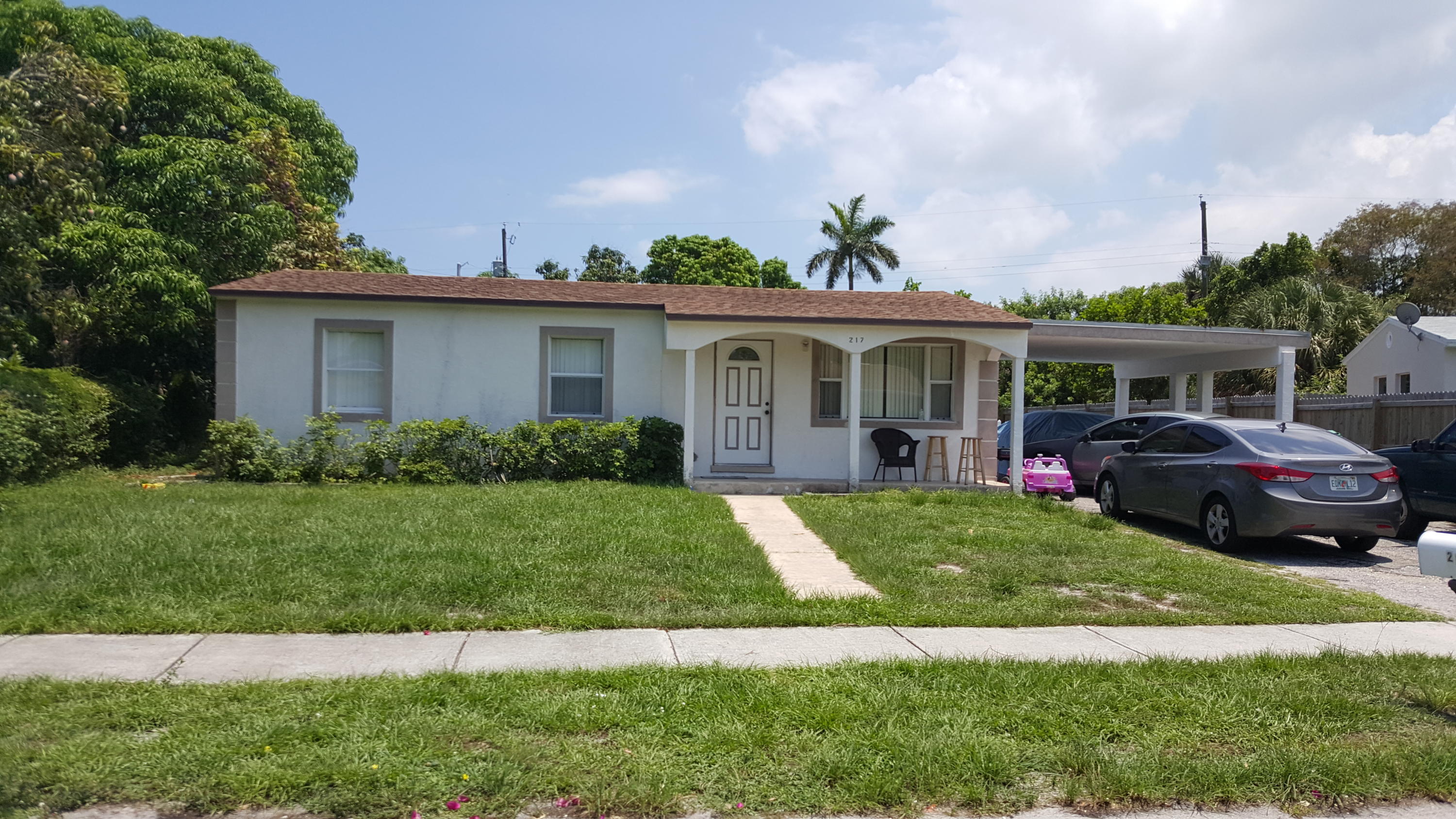 217 West 29th Street Riviera Beach, FL 33404 - Photo 1 of 27 Front View