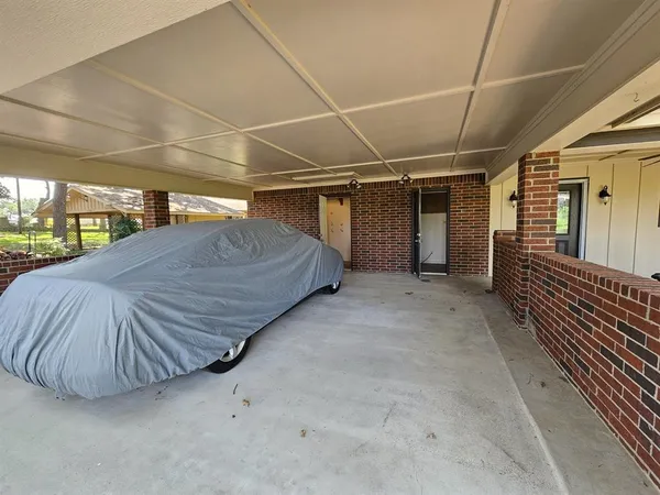 a view of a room with wooden walls