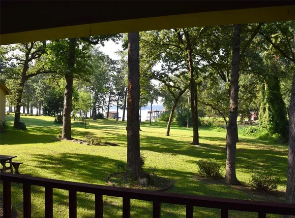 a view of swimming pool from a yard