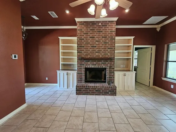 a view of a livingroom with a fireplace