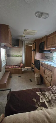 a view of a house with backyard