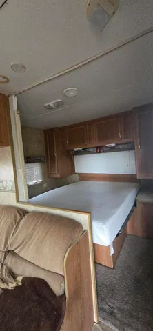 a view of outdoor space with deck and yard