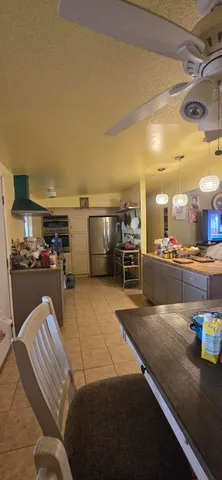 a bedroom with a bed and a mirror